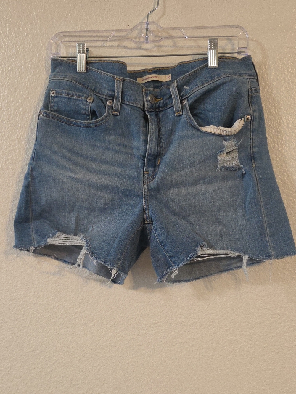 Distressed Light Blue Denim Cutoff Shorts for Women